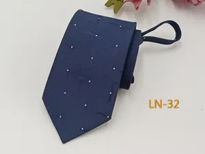 Men's zipper tie detail, dark blue jacquard fabric close-up, business formal wear accessory.