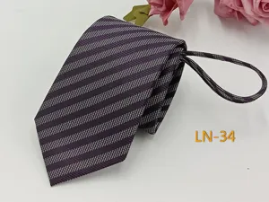 Detailed view of dark purple striped zipper tie with jacquard texture close-up shot.