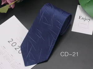 Close-up of navy blue men's tie with abstract line pattern, fine jacquard texture for business.
