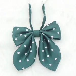 Dark green polka dot JK bow tie for women, cute Japanese school uniform collar ribbon accessory.