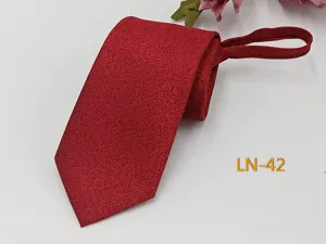 Detail view of red men's zipper tie, textured jacquard fabric, easy-pull neckwear accessory