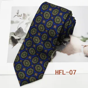 Classic blue retro medallion men's tie, detailed view showcasing vintage fabric pattern.