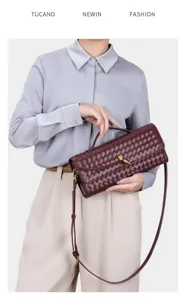 Elegant burgundy woven leather shoulder bag with metal knot closure for women daily fashion.