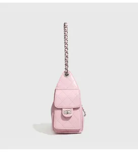 Pink quilted leather shoulder bag detail, stylish chain strap and turn-lock closure.