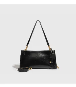 Bolso de hombro negro de charol elegante bolso retro con herrajes metálicos elegantes