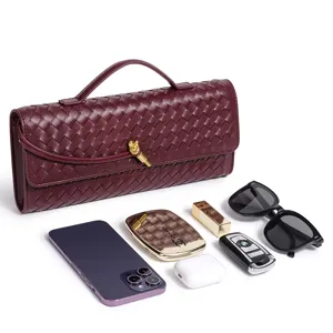 Elegant woven leather evening handbag with top handle, stylish chic clutch purse for women.