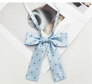 Light blue polka dot JK bow tie with long ribbon tails, perfect for uniform or daily cute wear.