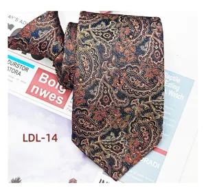 Closeup view of business casual paisley jacquard zipper necktie showing fabric texture.