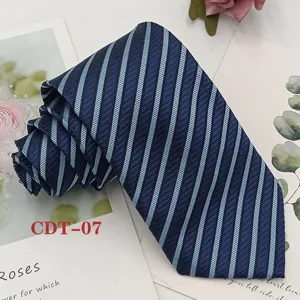 Detailed close up view of classic navy blue striped men business jacquard tie fabric.