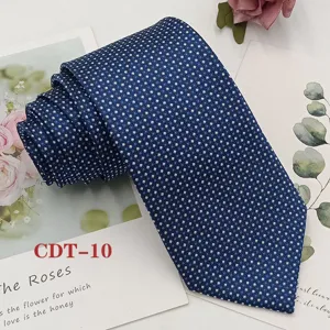 Detailed view of a classic blue men's necktie featuring an intricate white micro geometric pattern.