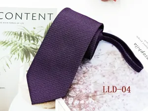Purple business men's necktie with fine textured pattern, elegant formal wear accessory.