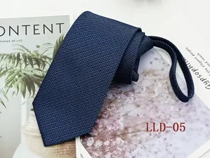 Close-up detail of dark blue business necktie with fine texture and convenient zipper design.