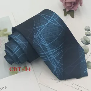 Detailed view of a stylish blue geometric jacquard necktie, perfect for formal business attire.