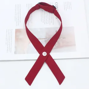 Red cross tie JK uniform collar bow detail view, stylish and cute accessory for women.