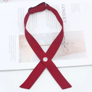 Red solid fine cross tie detail shot, perfect JK uniform accessory with elegant white button accent.