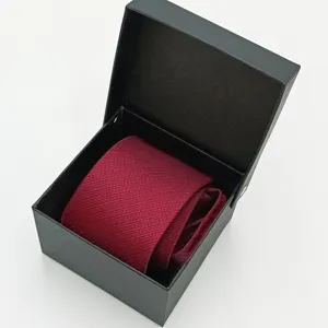 Men's red necktie in a sleek black gift box, ideal for formal business and weddings.
