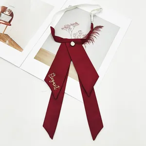 Wine red JK bow tie for women, Korean college style ribbon collar with elegant embroidery.
