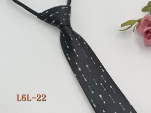 Detail view of a men's narrow black zipper necktie featuring a stylish white arrow pattern.