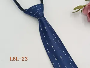 Close-up view of the stylish blue necktie featuring neat white arrow patterns and zipper.