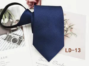 Detail view of men's dark blue zipper tie, classic twill business necktie close-up.