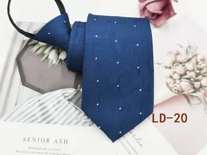 Detailed view of the elegant blue zipper business tie showcasing fine woven geometric texture.
