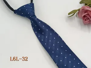Detailed view of dark blue men's business zipper tie with white polka dots and texture.