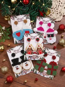 Handmade seed bead Christmas earrings featuring cute Santa and snowman designs for festive wear.
