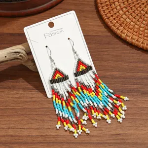 Χειροποίητα boho σκουλαρίκια με χάντρες και κρόσσια για ethnic καλοκαιρινό στιλ τώρα.