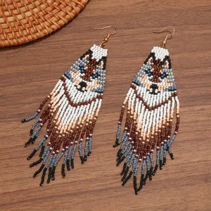 Bohemian handmade beaded fringe earrings, ethnic wolf animal pattern seed bead long hooks.