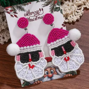 Handmade beaded Santa Claus earrings with sunglasses, festive holiday jewelry gift for women.