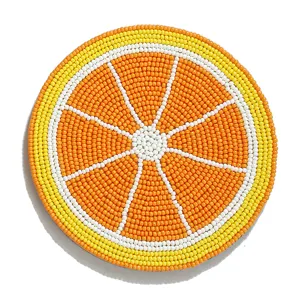 Handgemaakte rocailles kralen sinaasappel onderzetter, kleurrijke citrus tafelmat.