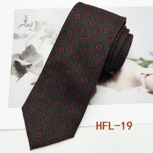 Green retro medallion men's tie detailed view, classic woven fabric for business and formal wear.