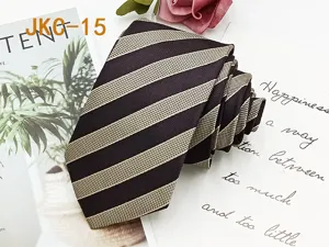 Dark brown and beige striped tie detail shot, showcasing fine fabric texture and fold.