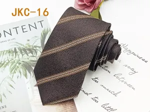 Detailed shot of a classic brown striped JK uniform tie, stylish jacquard fabric accessory.