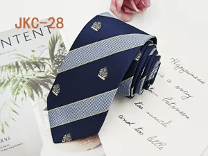 Detailed view of 7cm JK uniform striped necktie with elegant crest embroidery for stylish wear.