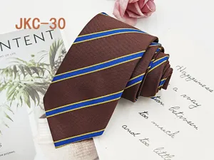 Detail view of brown JK uniform necktie with classic blue and yellow striped jacquard.