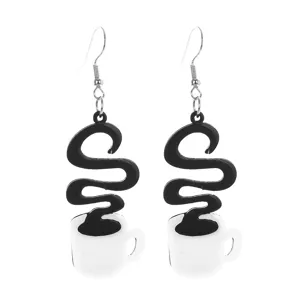 Close-up detail of quirky black and white acrylic coffee cup dangle earrings for daily wear.