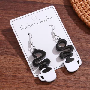 Black and white acrylic coffee cup dangle earrings with display card for women daily wear.