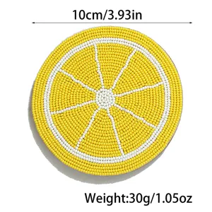 Handgemaakte kraal citroenschijf onderzetter detail, 10cm diameter, decoratieve hittebestendige mat.