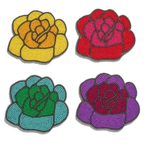 Handmade beaded rose flower coaster set for table decoration and heat insulation cups.