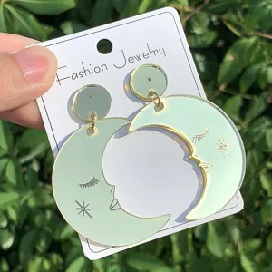 Pendientes de acrílico luna y sol hechos a mano con espejo dorado, joyería de moda elegante.