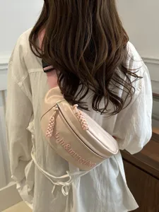 Trendy women's crossbody chest bag with adjustable strap, casual fanny pack for daily wear.