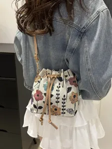 Borsa a secchiello tessuta in stile etnico da donna, elegante borsa a tracolla in tela floreale.
