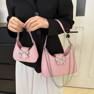 Graziosa borsa a mano rosa con fiocco per donne, borsa a spalla alla moda con catena e fiocco.