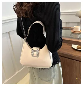 Borsa a spalla chic con elegante decorazione a fiocco e catena, ideale per ogni look.