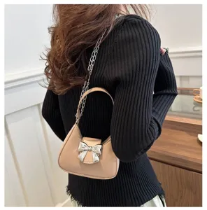 Borsa a tracolla chic con fiocco da donna, elegante borsa in pelle sintetica con catena.