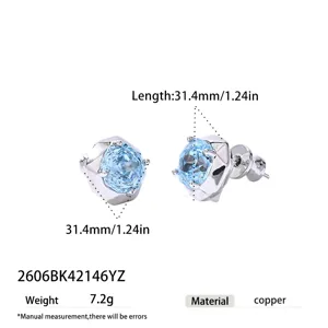 Silver tone copper stud earrings featuring light blue rose cut cubic zirconia stones.