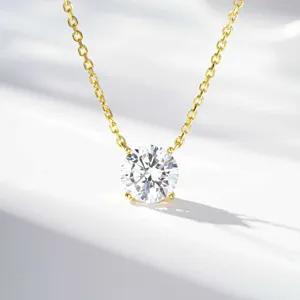Close-up shot of a classic four-prong solitaire pendant necklace showcasing brilliant cut stone.