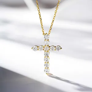 Exquisite S925 sterling silver cross necklace detail featuring brilliant moissanite stones.