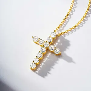 Elegant gold plated silver cross necklace with sparkling moissanite stones for daily wear.